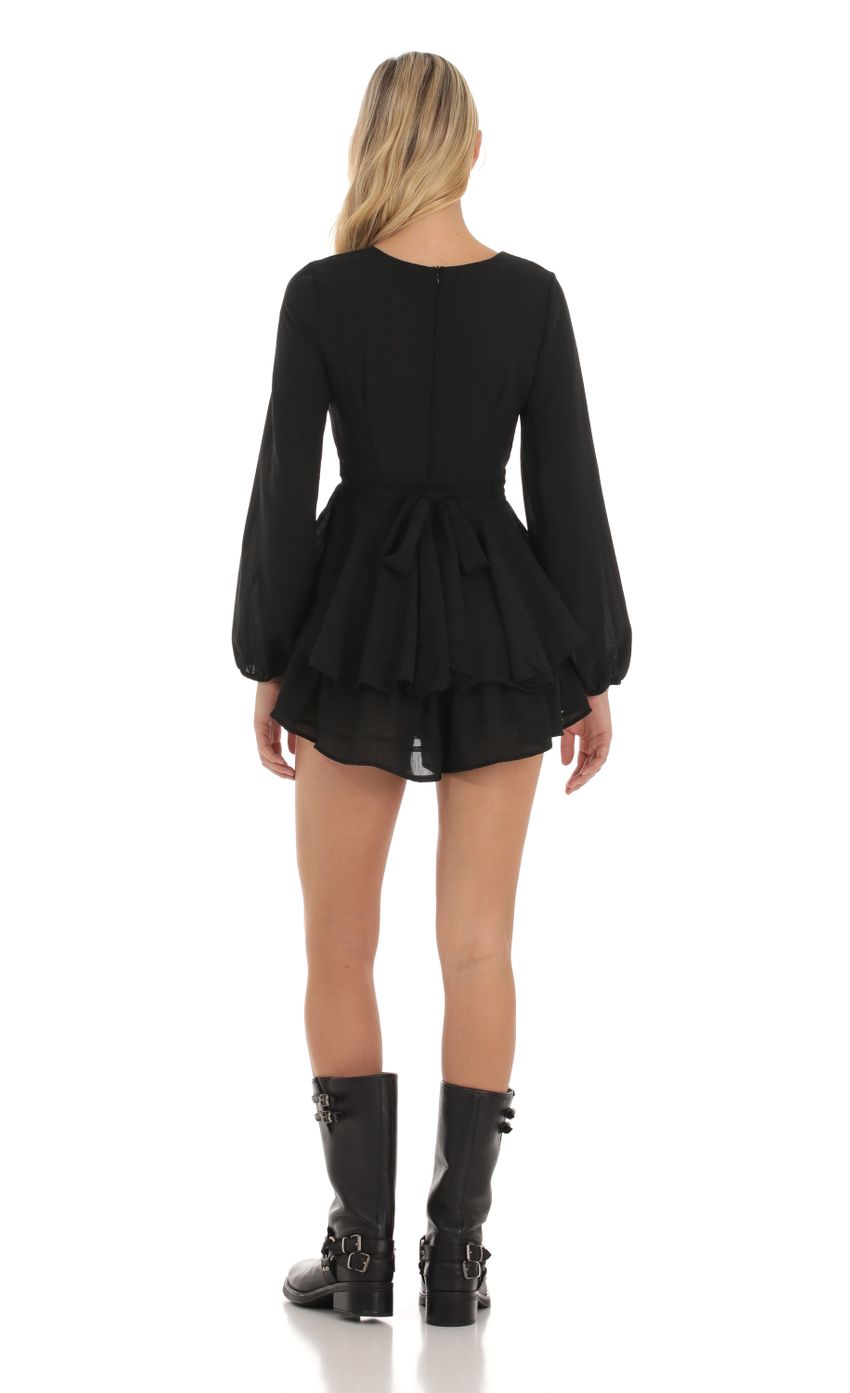 Picture Long Sleeve Wrap Romper in Black. Source: https://media.lucyinthesky.com/data/Oct23/850xAUTO/b0c6095b-3566-4748-8e20-fa749442ad2d.jpg