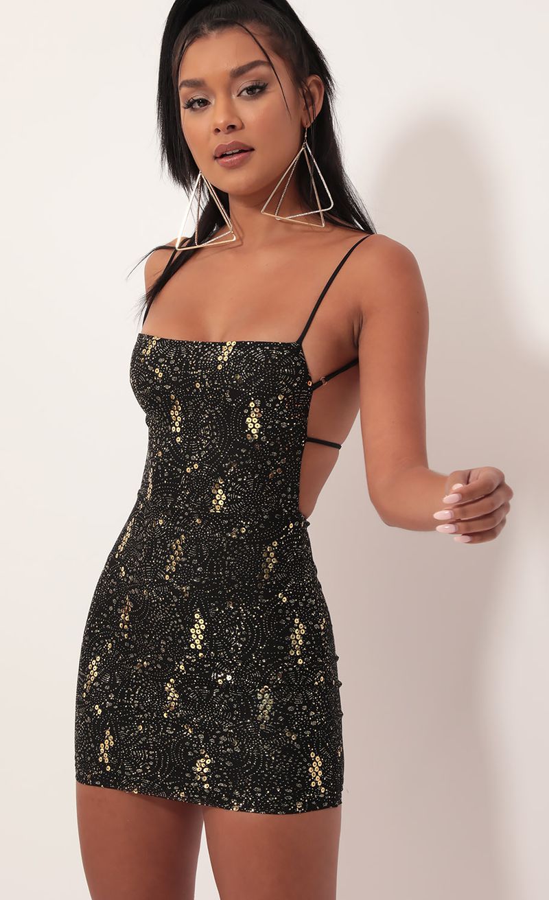 Picture Starstruck Strappy Dress in Black Starlight. Source: https://media.lucyinthesky.com/data/Sep19_2/800xAUTO/781A3513.JPG