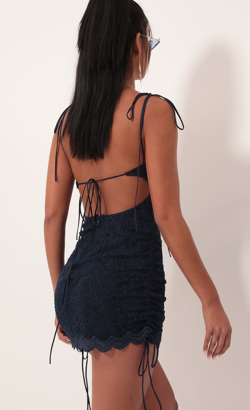 Picture Pierra Scalloped Lace Dress in Navy. Source: https://media.lucyinthesky.com/data/Sep19_2/800xAUTO/781A4118.JPG