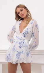 Picture Lexi Ruffle Wrap Dress in Black Floral. Source: https://media.lucyinthesky.com/data/Sep20_1/150xAUTO/781A6486.JPG