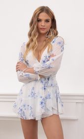 Picture thumb Lexi Ruffle Wrap Dress in Blue Floral. Source: https://media.lucyinthesky.com/data/Sep20_1/170xAUTO/781A6451.JPG