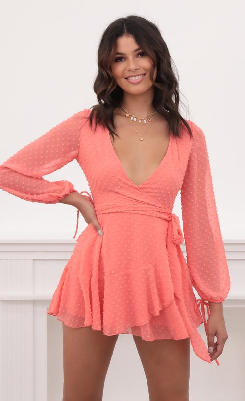 Picture Lexi Ruffle Wrap Dress in Dotted Coral. Source: https://media.lucyinthesky.com/data/Sep20_1/500xAUTO/781A1013.JPG