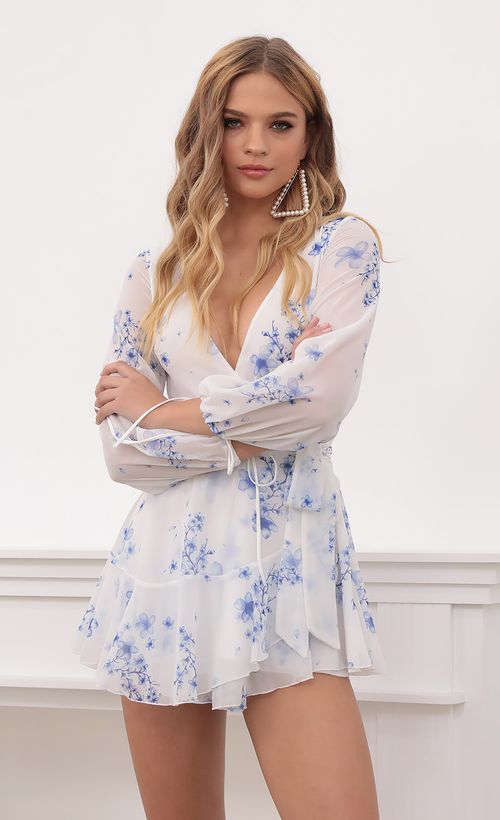 Picture Lexi Ruffle Wrap Dress in Blue Floral. Source: https://media.lucyinthesky.com/data/Sep20_1/500xAUTO/781A6451.JPG