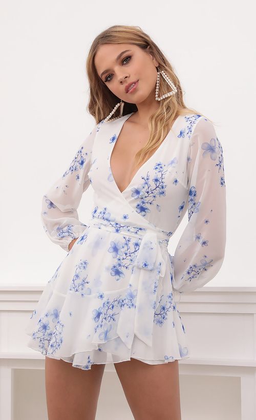 Picture Lexi Ruffle Wrap Dress in Blue Floral. Source: https://media.lucyinthesky.com/data/Sep20_1/500xAUTO/781A6486.JPG