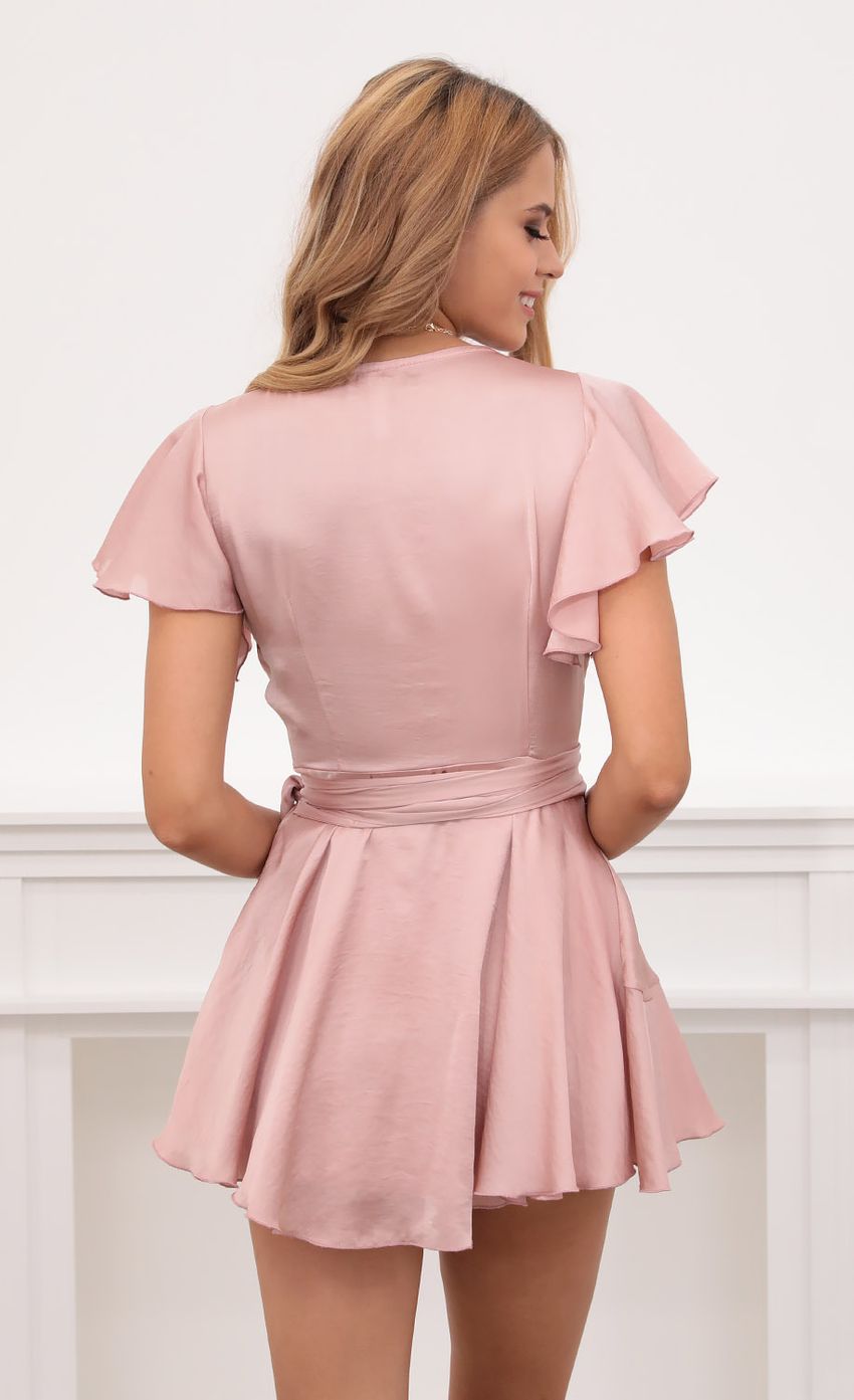 Picture Eliza Wrap Dress in Blush Satin. Source: https://media.lucyinthesky.com/data/Sep20_1/850xAUTO/781A6370.JPG