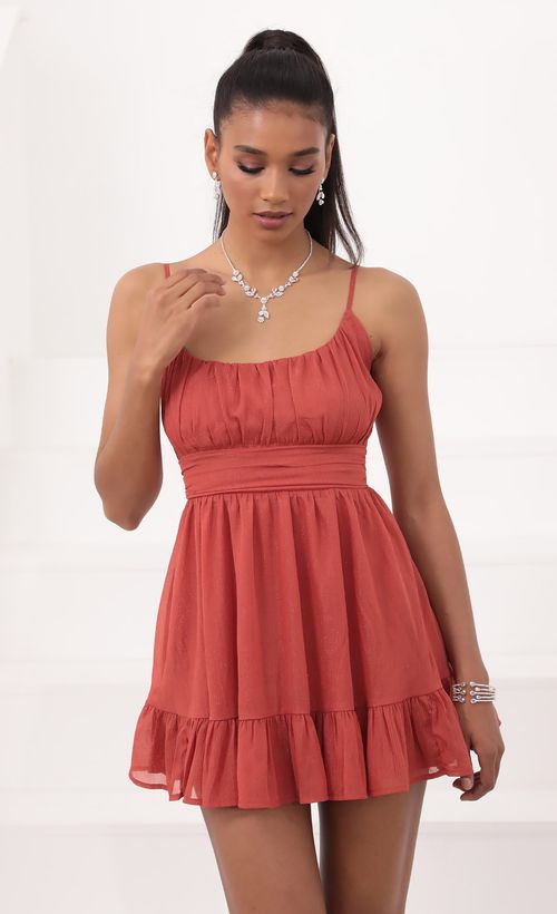 Picture Molly Ruffled Chiffon Dress in Rust. Source: https://media.lucyinthesky.com/data/Sep20_2/500xAUTO/781A0631.JPG