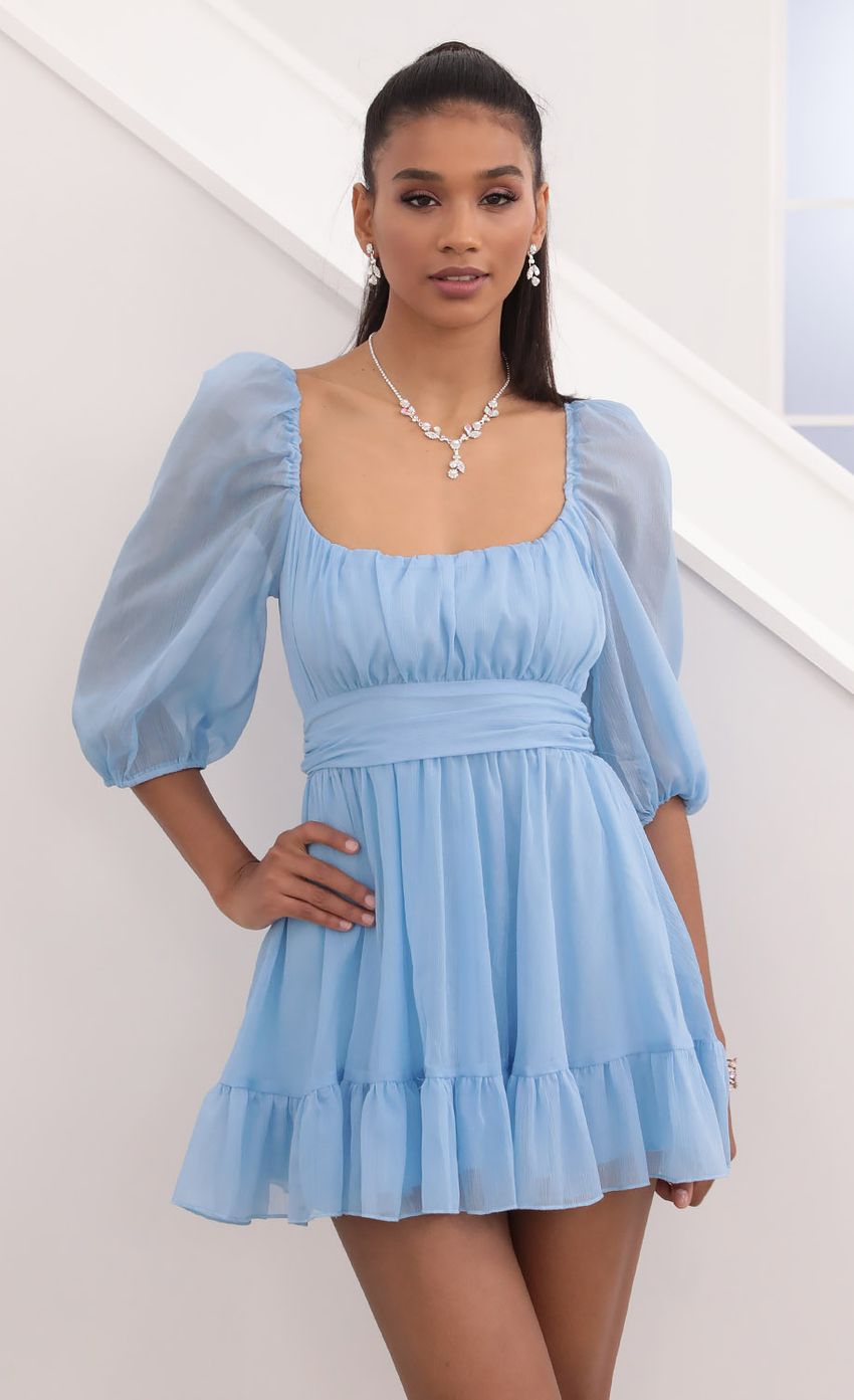 Picture Ruffle Chiffon Dress in Blue. Source: https://media.lucyinthesky.com/data/Sep20_2/850xAUTO/781A0301.JPG