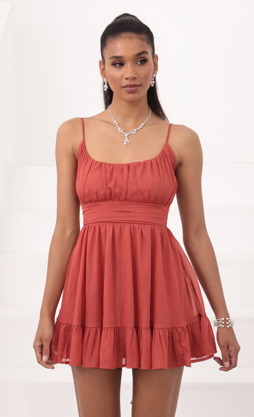 Picture Molly Ruffled Chiffon Dress in Rust. Source: https://media.lucyinthesky.com/data/Sep20_2/850xAUTO/781A0602.JPG