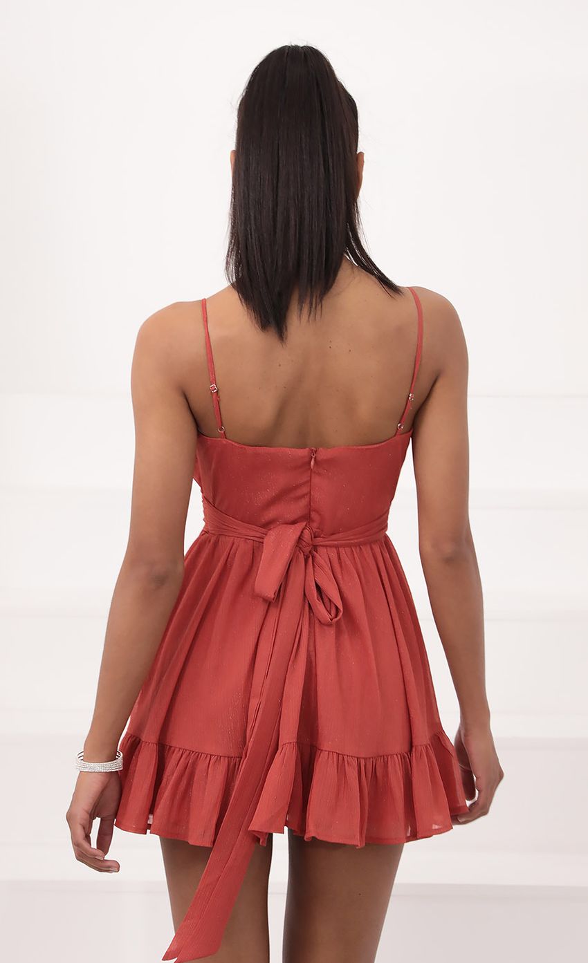 Picture Molly Ruffled Chiffon Dress in Rust. Source: https://media.lucyinthesky.com/data/Sep20_2/850xAUTO/781A0696.JPG