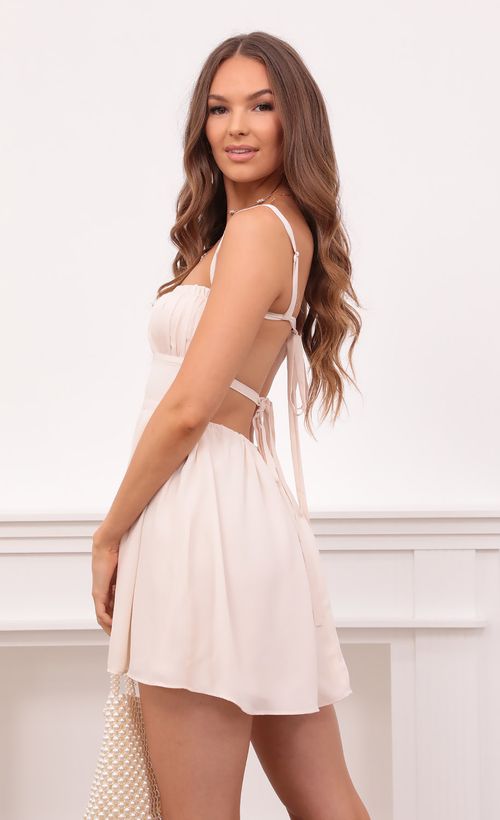 Picture Sawyer Fit and Flare Dress in Cream. Source: https://media.lucyinthesky.com/data/Sep21_1/500xAUTO/1V9A0219.JPG