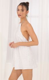 Picture thumb Tallulah Glitter Open Back Dress in White   . Source: https://media.lucyinthesky.com/data/Sep22/170xAUTO/ccc1e82d-f643-48fc-91ed-b53f43e9844b.jpg
