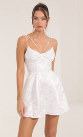 Picture thumb Siena Floral Jacquard Corset Dress in White. Source: https://media.lucyinthesky.com/data/Sep22/170xAUTO/ecbeb103-b8f4-4225-9d68-96f76798e7b2.jpg