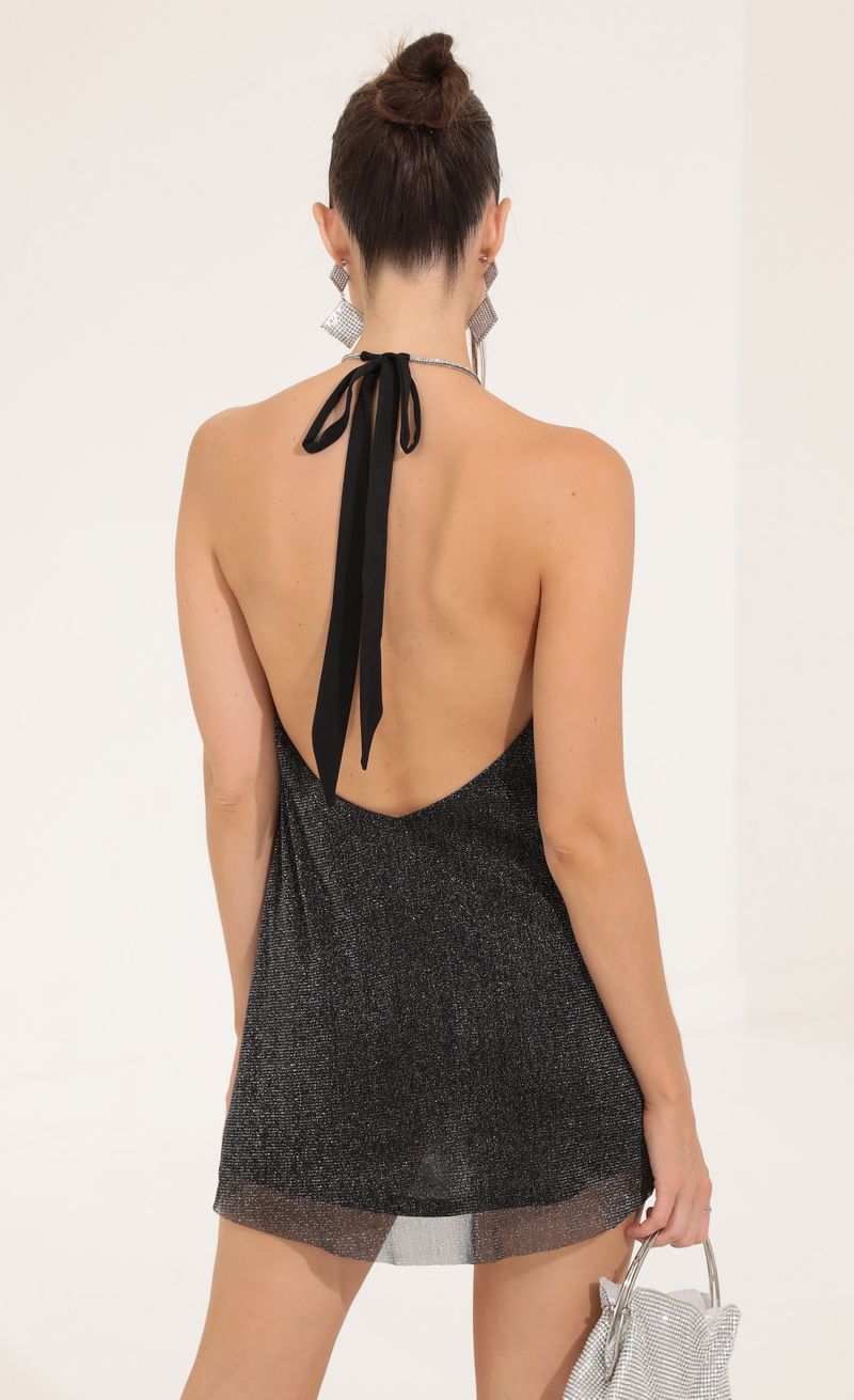 Picture Tallulah Glitter Open Back Dress in Black. Source: https://media.lucyinthesky.com/data/Sep22/800xAUTO/13843a2a-eeb6-489b-8d31-828dbe76515f.jpg