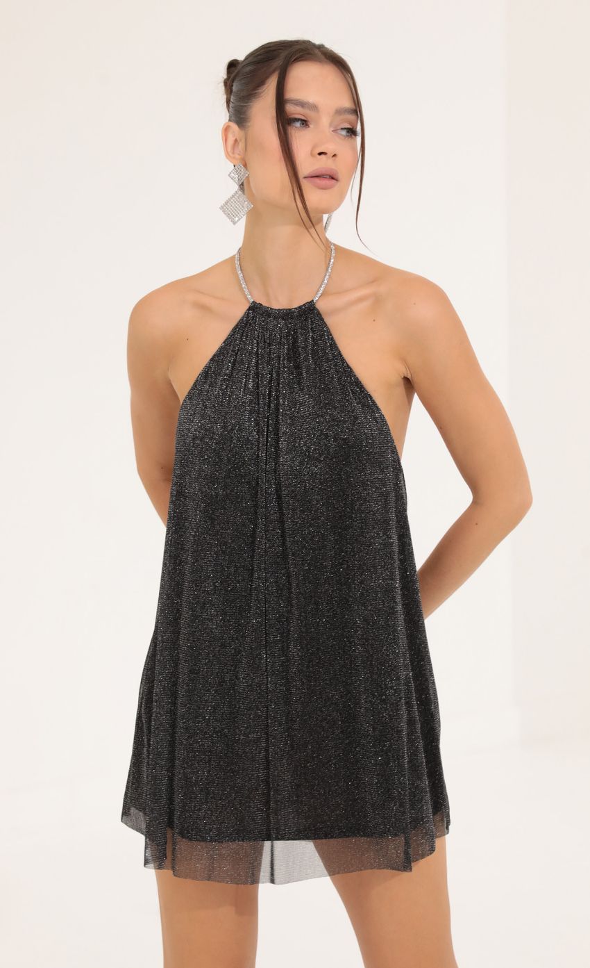 Picture Tallulah Glitter Open Back Dress in Black. Source: https://media.lucyinthesky.com/data/Sep22/850xAUTO/47732d63-516e-4a6c-b648-5239d6e1a81b.jpg