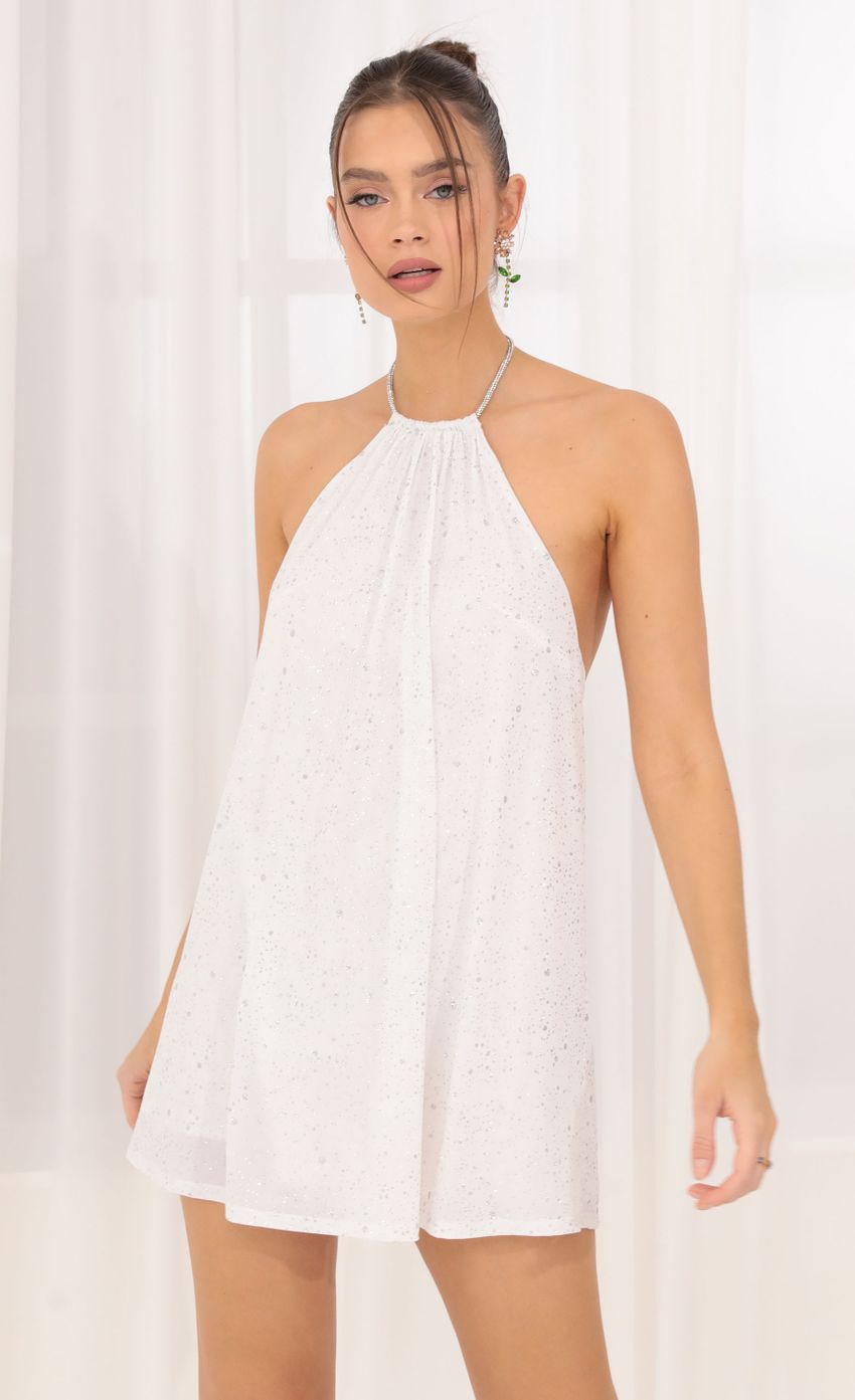Picture Tallulah Glitter Open Back Dress in White. Source: https://media.lucyinthesky.com/data/Sep22/850xAUTO/48d3bb6d-15fb-4840-95c2-ba015ba8b8f5.jpg