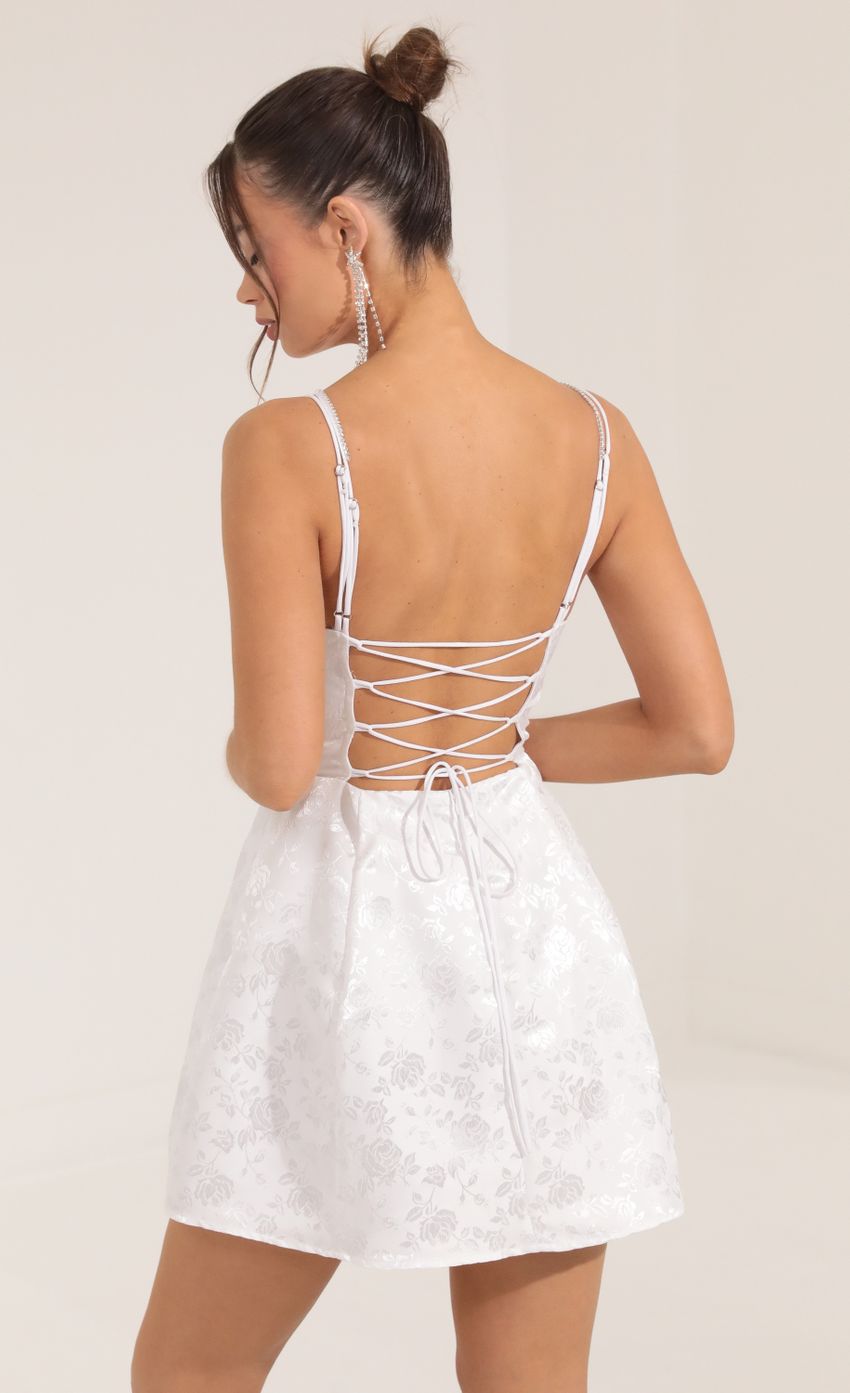 Picture Siena Floral Jacquard Corset Dress in White. Source: https://media.lucyinthesky.com/data/Sep22/850xAUTO/fd692649-ccc3-4ce2-9e7d-4ec41bd5fcd9.jpg