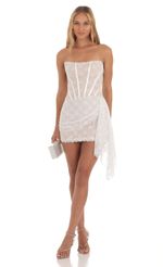 Picture Rivera White Lace Corset Drape Dress in Nude. Source: https://media.lucyinthesky.com/data/Sep23/150xAUTO/575a3e2c-edf4-4e2d-82d3-51d5147216a6.jpg