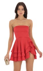 Picture Eulla Strapless Asymmetrical Dress in Red. Source: https://media.lucyinthesky.com/data/Sep23/150xAUTO/a737f3fb-2a9e-4663-8cad-c3ec5ba5e25d.jpg
