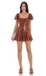 Picture Wannda Sequin Puff Sleeve Dress in Brown. Source: https://media.lucyinthesky.com/data/Sep23/150xAUTO/b1c39a20-edc3-4659-9040-fdee31f7803e.jpg