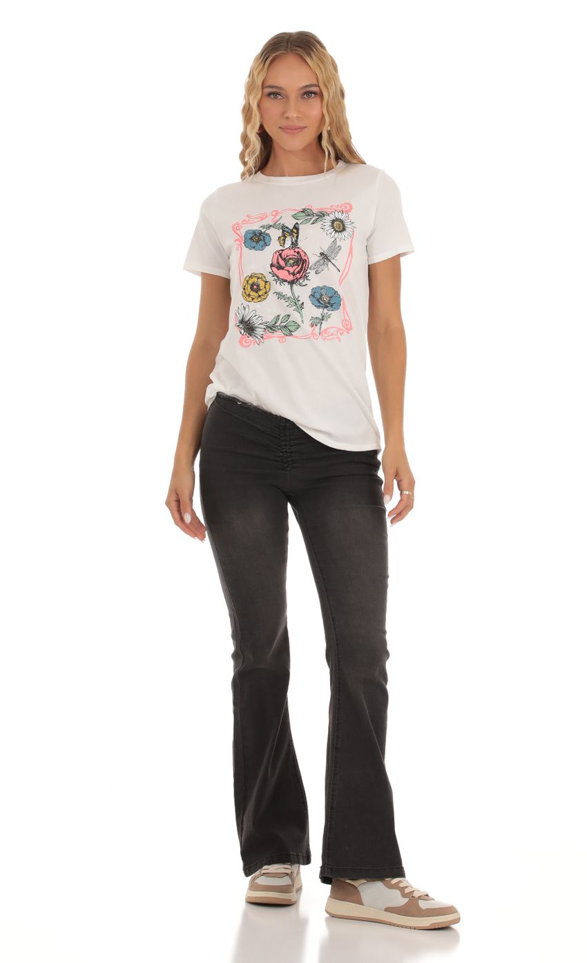 Picture Floral Graphic T-Shirt in White. Source: https://media.lucyinthesky.com/data/Sep23/850xAUTO/034fb32a-d467-490e-a927-fc5f3a5feec7.jpg
