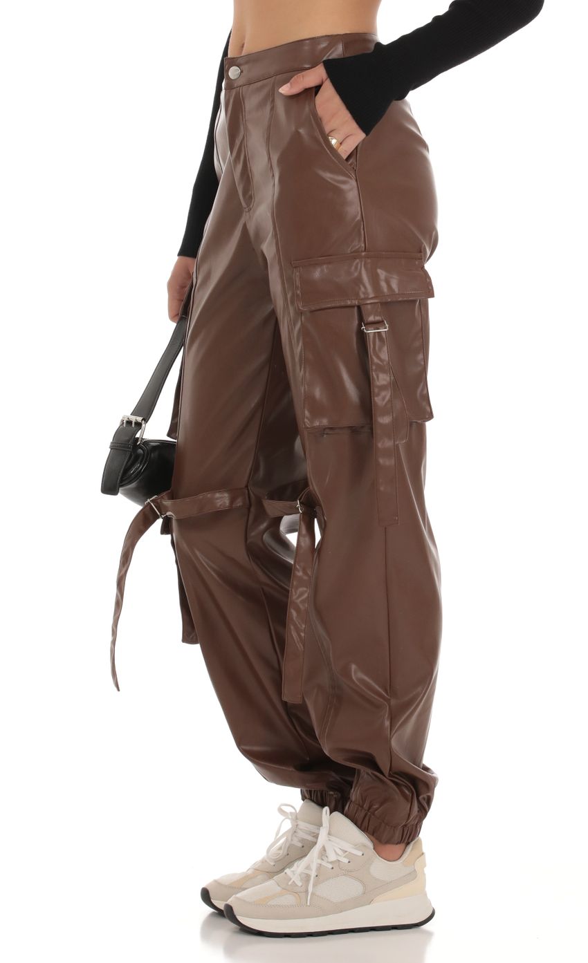 Picture Jai Pleather Cargo Pants in Brown. Source: https://media.lucyinthesky.com/data/Sep23/850xAUTO/06e7face-ae97-4830-87bb-993e224c0675.jpg