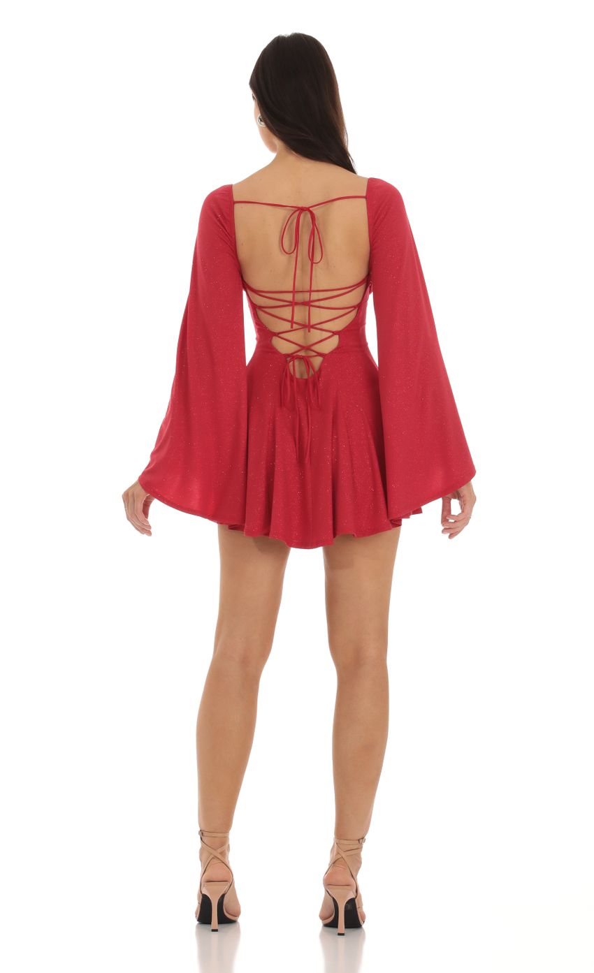 Picture Sirena Shimmer Flare Sleeve Dress in Red. Source: https://media.lucyinthesky.com/data/Sep23/850xAUTO/126d6e5d-0099-4323-895c-29b9238897ad.jpg
