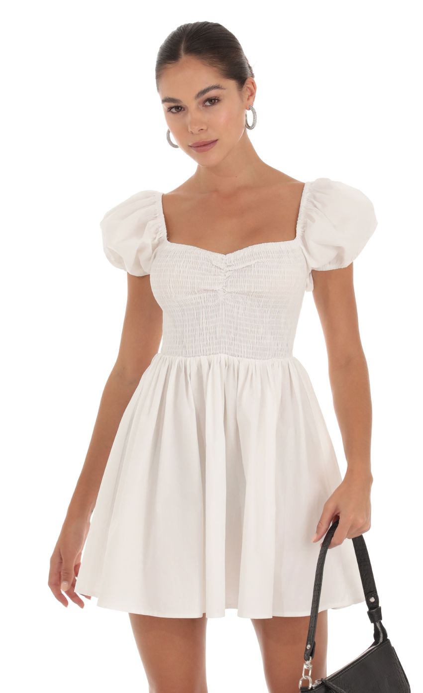 Picture Maceline Puff Sleeve Dress in White. Source: https://media.lucyinthesky.com/data/Sep23/850xAUTO/191d7e2b-72dd-43d4-b597-efb4cefe8472.jpg