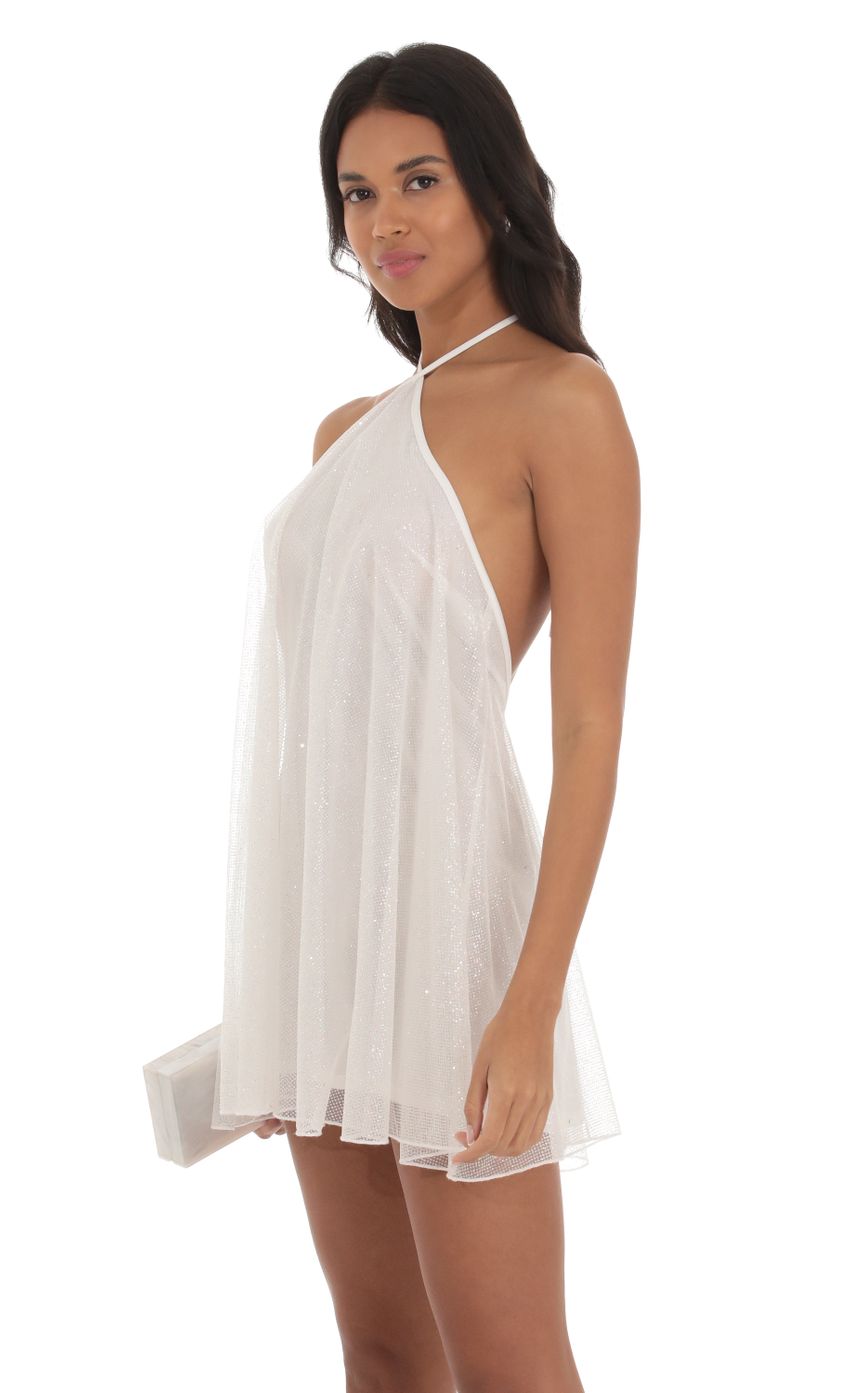 Picture Ala Shimmer Halter Shift Dress in White. Source: https://media.lucyinthesky.com/data/Sep23/850xAUTO/4af45181-04cb-4fce-b64a-72343ba63938.jpg