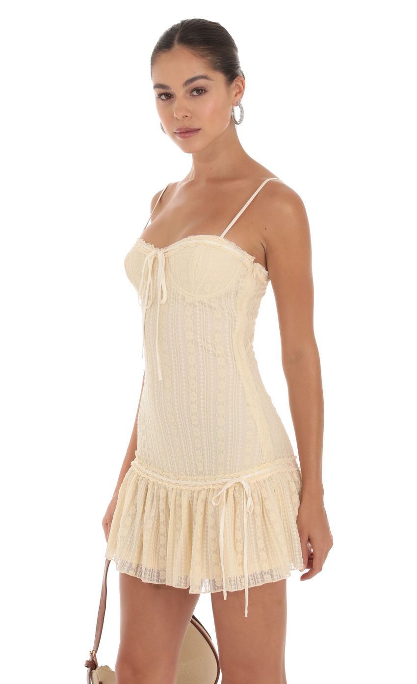 Picture Oceana Lace Ruffle Dress in Cream. Source: https://media.lucyinthesky.com/data/Sep23/850xAUTO/4b9961d5-5041-4de2-8f7f-f1aa1a686caa.jpg