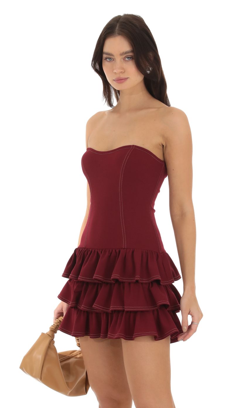 Picture Everlee Strapless Ruffle Dress in Red. Source: https://media.lucyinthesky.com/data/Sep23/850xAUTO/5c6f2ce3-a069-4d29-841b-cc9f4080b2cd.jpg