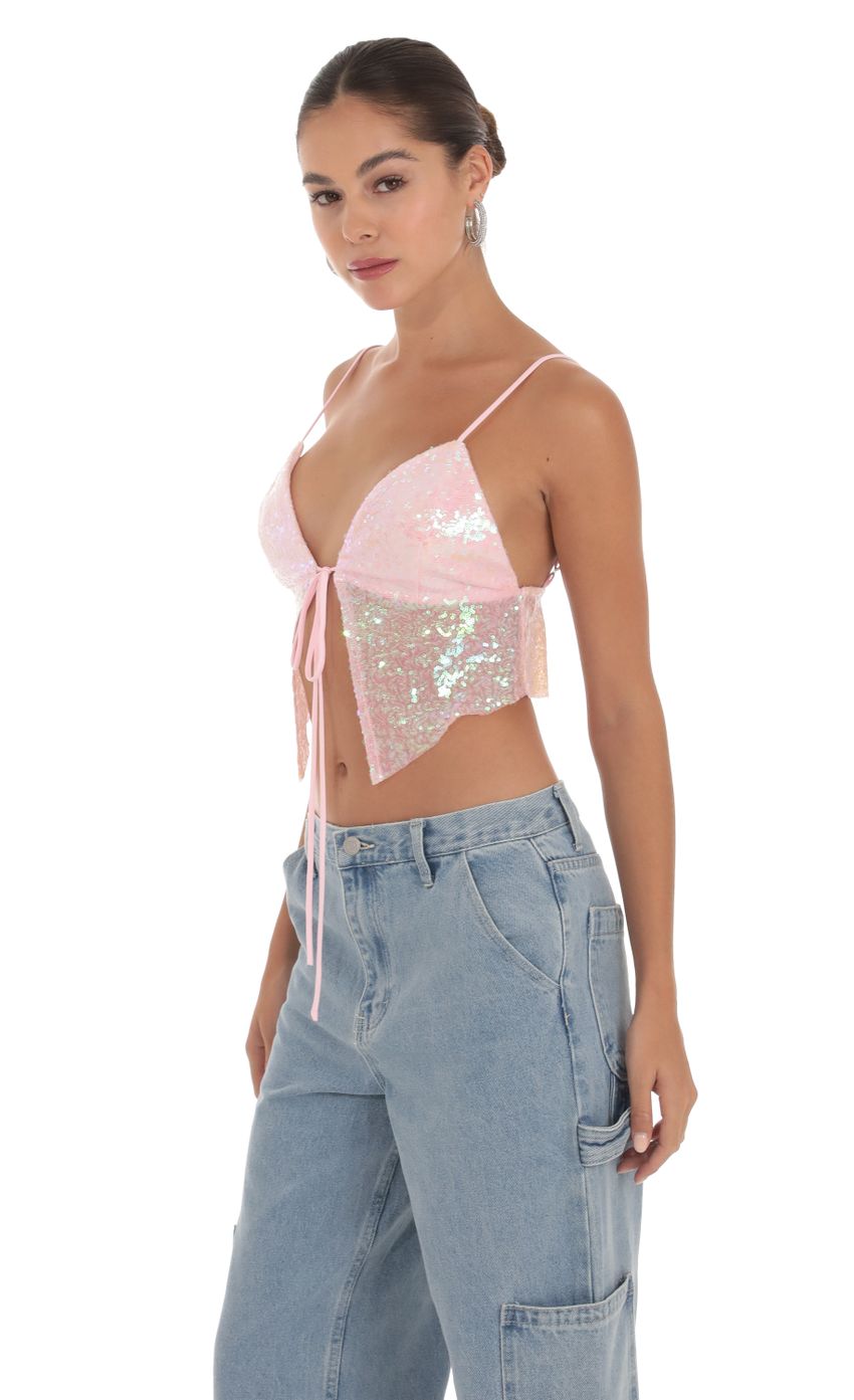 Picture Kaelynn Iridescent Sequin Top in Pink. Source: https://media.lucyinthesky.com/data/Sep23/850xAUTO/60be14f0-5160-4500-9f52-82a86b2cad66.jpg
