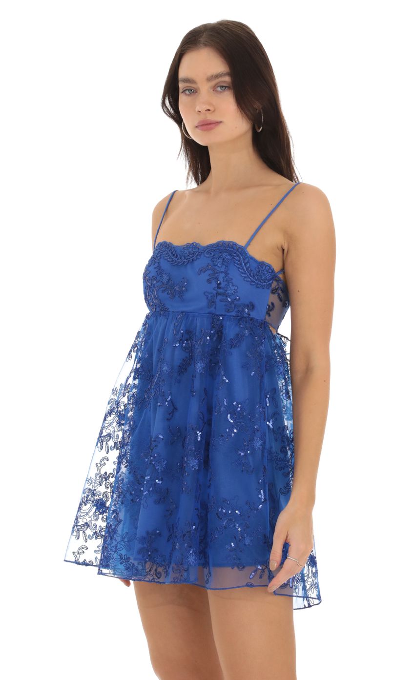 Picture Juno Sequin Baby Doll Dress in Blue. Source: https://media.lucyinthesky.com/data/Sep23/850xAUTO/704a755e-6861-479a-b004-bf9ffb26738b.jpg