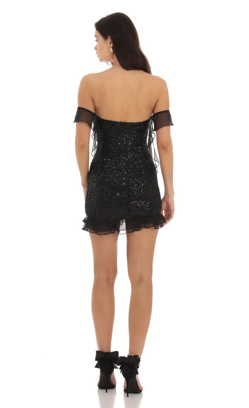 Picture Kiraz Sequin Off Shoulder Dress in Black. Source: https://media.lucyinthesky.com/data/Sep23/850xAUTO/7930b5cd-91f8-4301-ae27-947249f6ddf1.jpg