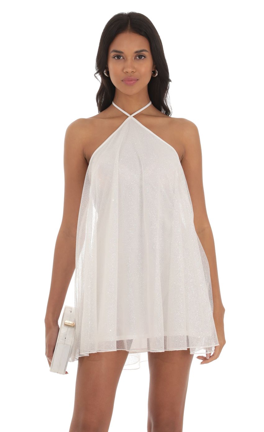 Picture Ala Shimmer Halter Shift Dress in White. Source: https://media.lucyinthesky.com/data/Sep23/850xAUTO/8fe46af7-d6b9-47dd-9355-95dfe59f945f.jpg