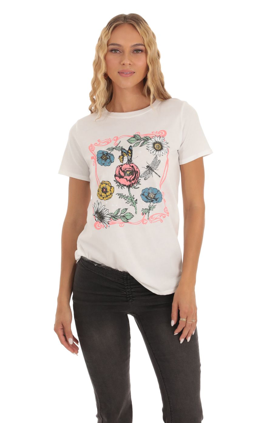 Picture Floral Graphic T-Shirt in White. Source: https://media.lucyinthesky.com/data/Sep23/850xAUTO/93df4727-db0a-42cb-a790-16cc7d9c4669.jpg