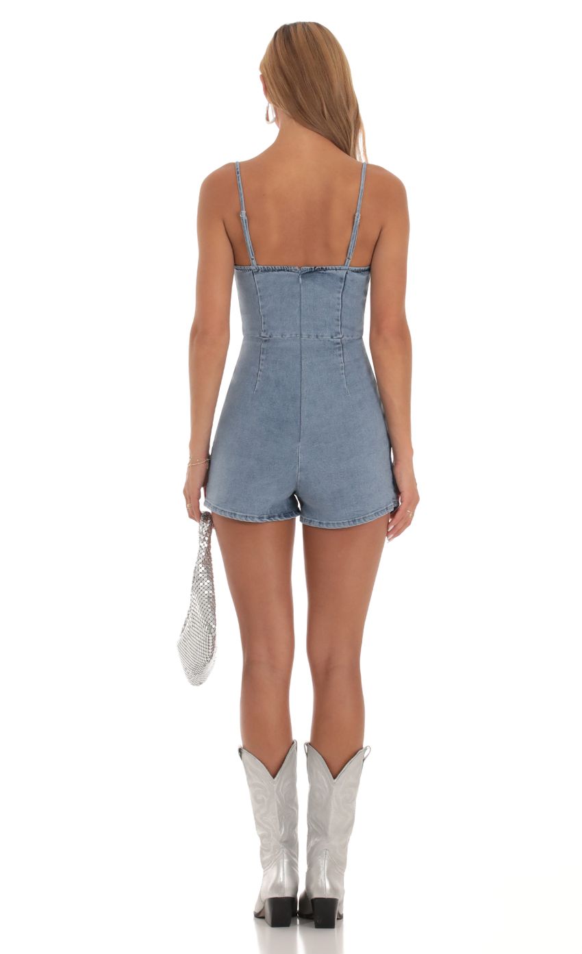 Picture Caisyn Faux Wrap Romper in Denim. Source: https://media.lucyinthesky.com/data/Sep23/850xAUTO/9ca4eac1-aa92-4a43-bd72-de1d496273e2.jpg