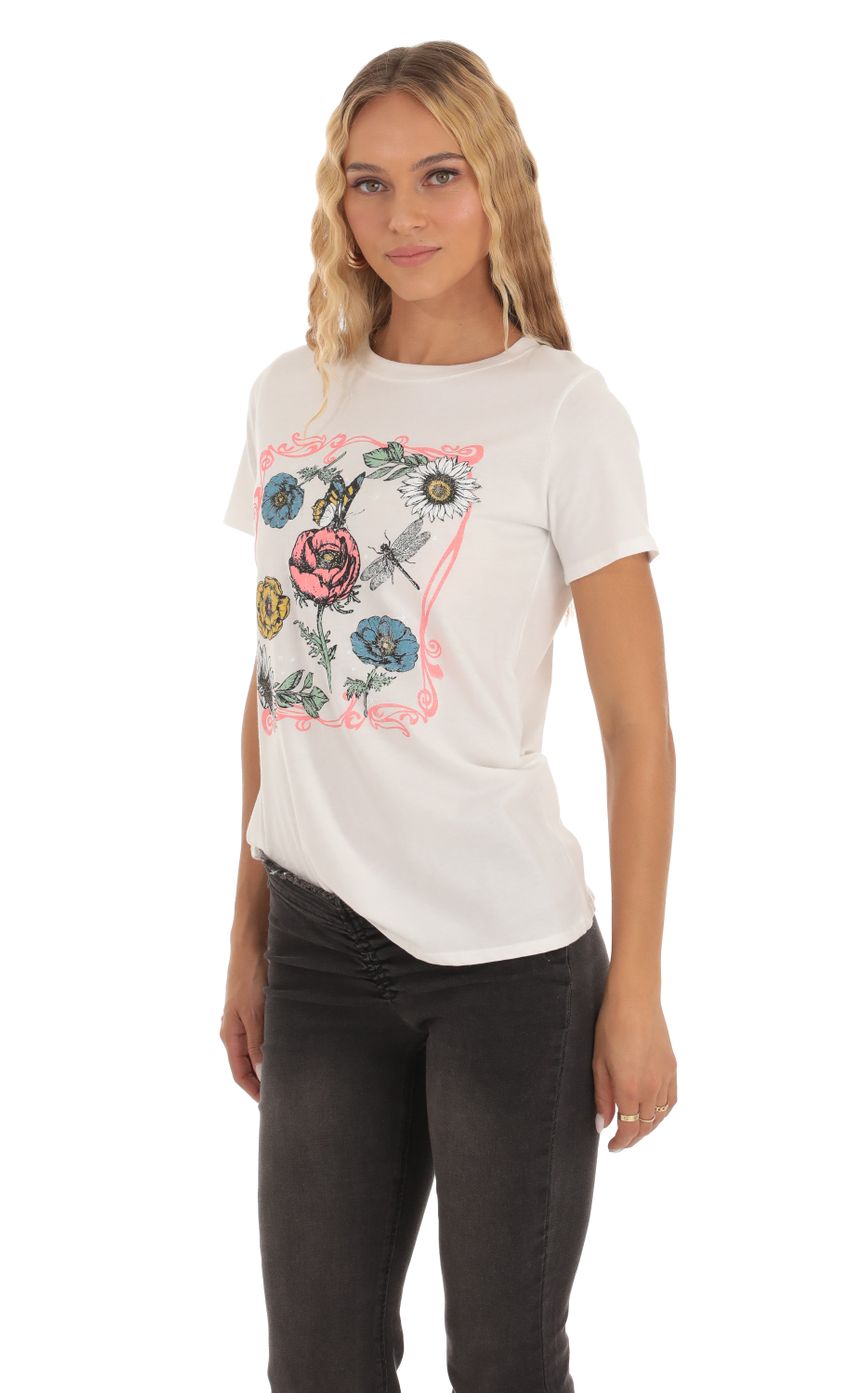 Picture Floral Graphic T-Shirt in White. Source: https://media.lucyinthesky.com/data/Sep23/850xAUTO/a5022f75-e330-4ce4-87ea-8bd72ac5ba91.jpg