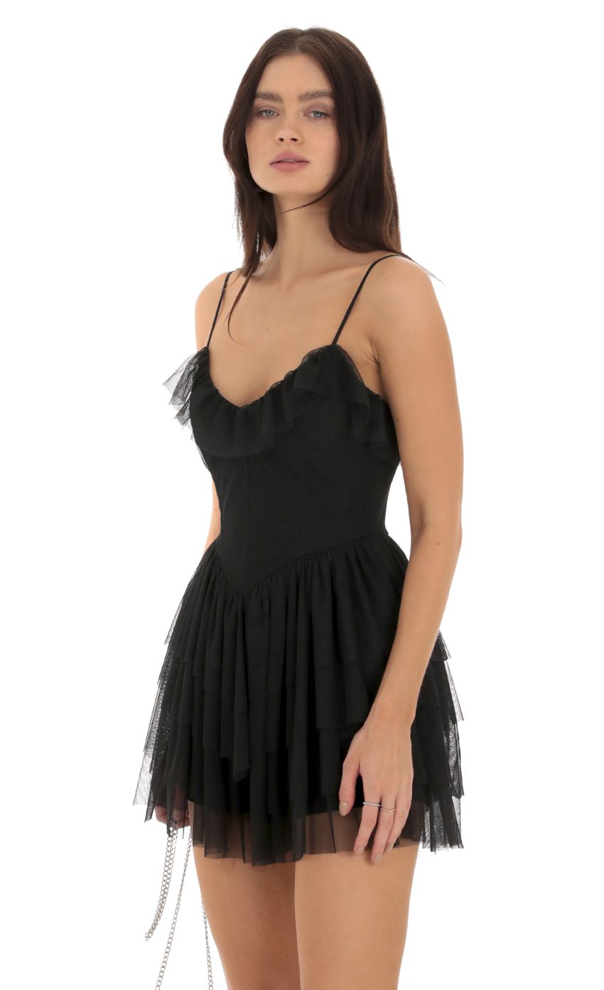Picture Kailin Corset Ruffle Romper in Black. Source: https://media.lucyinthesky.com/data/Sep23/850xAUTO/cef0a820-8c35-47b3-a339-5b831ee9a242.jpg