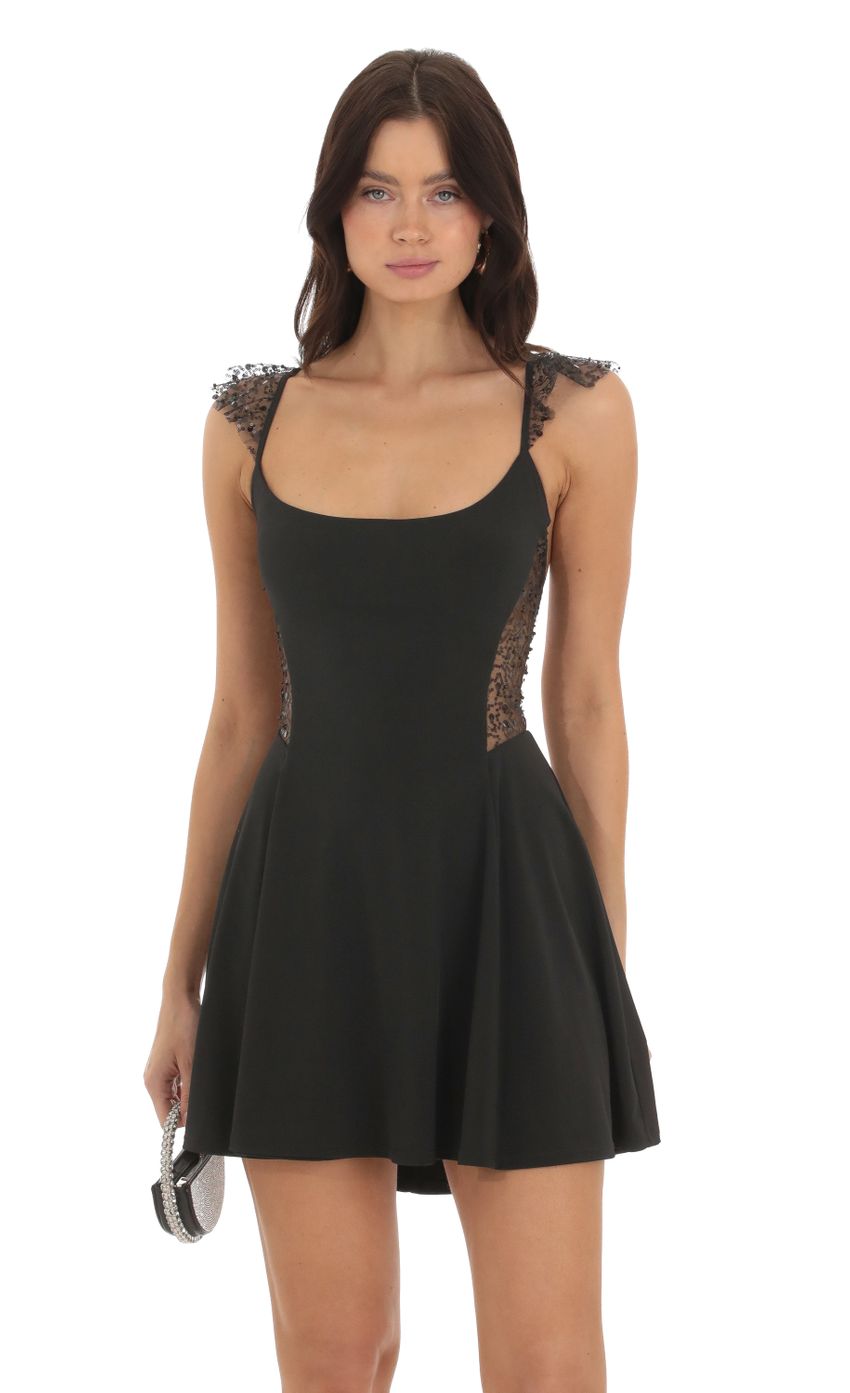 Picture Thalassa Sequin A-line Dress in Black. Source: https://media.lucyinthesky.com/data/Sep23/850xAUTO/d1be1623-5f91-47ff-822c-b302ea9f7ce3.jpg