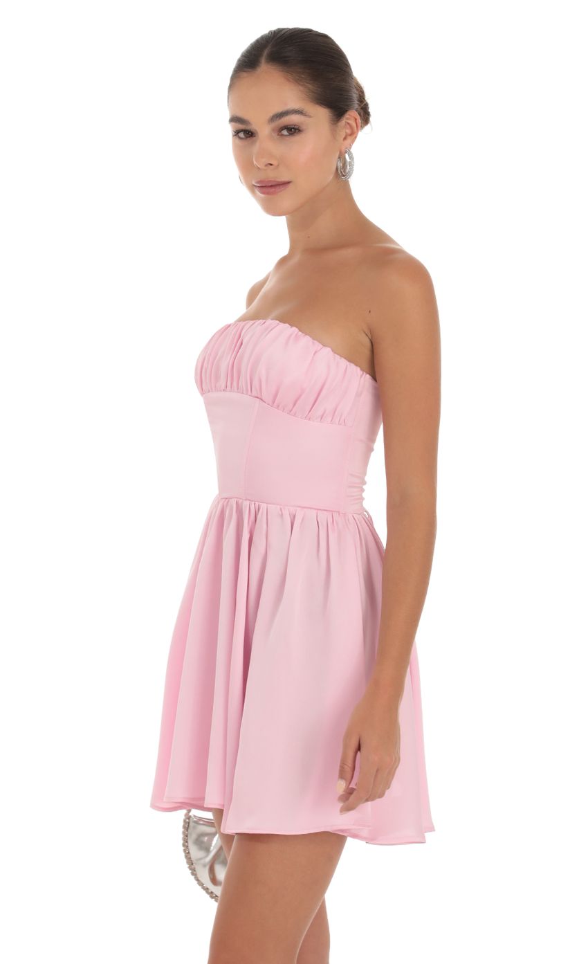 Picture Glinda Satin Corset Dress in Pink. Source: https://media.lucyinthesky.com/data/Sep23/850xAUTO/f0b5e6f6-ca89-4939-91b4-c8526b1dfe29.jpg
